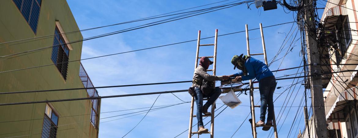 Technicians Installing Telephone Lines